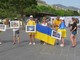 La manifestazione con le foto della guerra in Ucraina