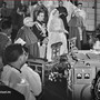 Grace Kelly e il principe Ranieri III durante la cerimonia nuziale del 1956, in un’immagine conservata dagli Archives du Palais de Monaco e dall’Institut audiovisuel de Monaco.
