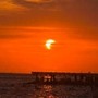Eclissi parziale di sole, lo spettacolo al tramonto nei cieli d'Italia Eclissi parziale di sole, lo spettacolo al tramonto nei cieli d'Italia